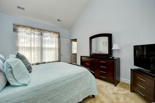 6172 Catalina Dr Unit 113, North Myrtle Beach, SC 29582 - bedroom with light carpet and high vaulted ceiling