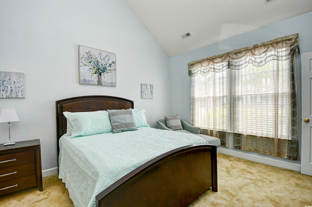 6172 Catalina Dr Unit 113, North Myrtle Beach, SC 29582 - bedroom with light carpet and lofted ceiling