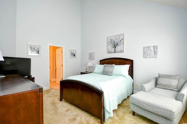 6172 Catalina Dr Unit 113, North Myrtle Beach, SC 29582 - bedroom with a high ceiling and light colored carpet
