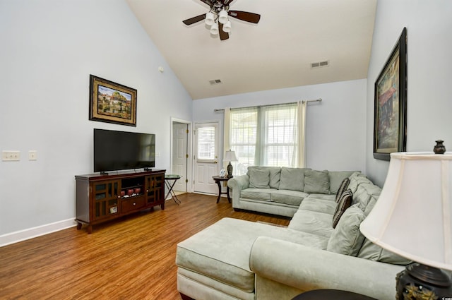 6172 Catalina Dr Unit 113, North Myrtle Beach, SC 29582 - living room featuring a ceiling fan, wood finished floors, and high vaulted ceiling