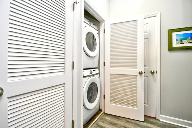 5825 Catalina Dr Unit 833, North Myrtle Beach, SC 29582 - laundry room with stacked washing machine and dryer and wood finished floors