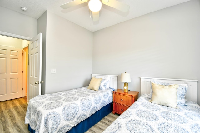 5825 Catalina Dr Unit 833, North Myrtle Beach, SC 29582 - bedroom with wood finished floors and a ceiling fan