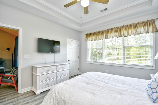5825 Catalina Dr Unit 833, North Myrtle Beach, SC 29582 - bedroom featuring ornamental molding, light wood-style floors, and ceiling fan