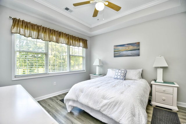 5825 Catalina Dr Unit 833, North Myrtle Beach, SC 29582 - bedroom with wood finished floors, ornamental molding, and ceiling fan