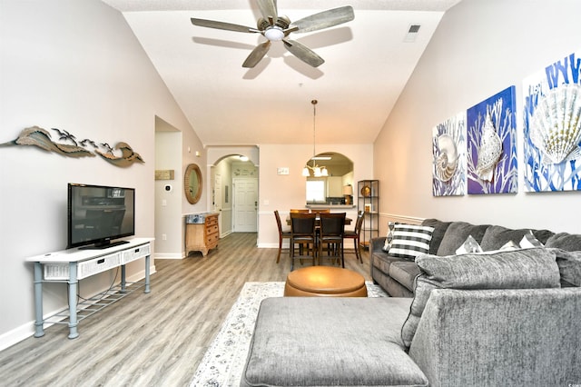 5825 Catalina Dr Unit 833, North Myrtle Beach, SC 29582 - living area with arched walkways, a ceiling fan, light wood finished floors, and high vaulted ceiling