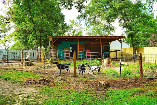 160 Comanche Dr, Georgetown, SC 29440 - back of property with an outdoor structure and an exterior structure