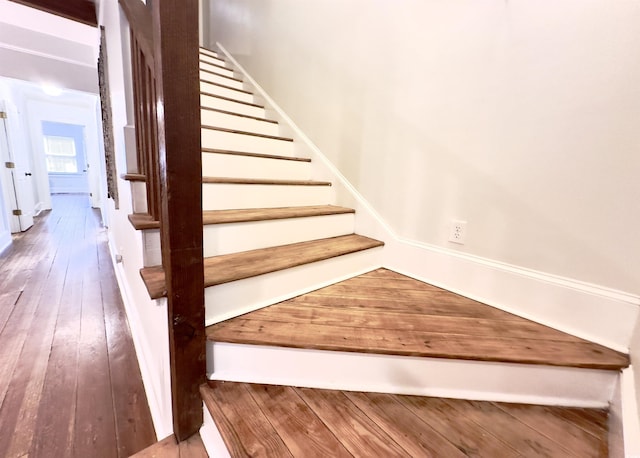 160 Comanche Dr, Georgetown, SC 29440 - staircase featuring hardwood / wood-style flooring and baseboards