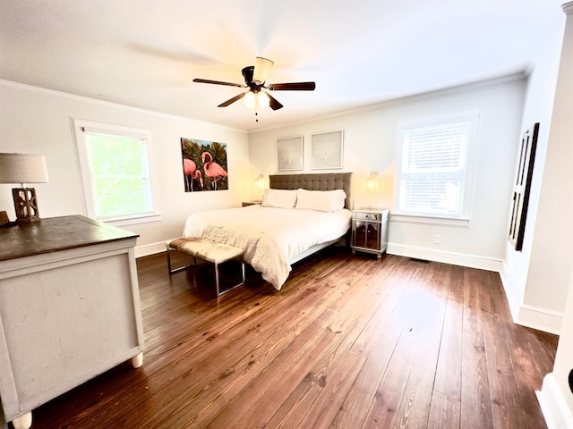 160 Comanche Dr, Georgetown, SC 29440 - bedroom featuring ornamental molding, dark wood-style flooring, and ceiling fan
