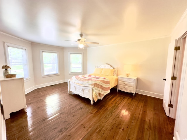 160 Comanche Dr, Georgetown, SC 29440 - bedroom with ornamental molding, dark wood-style flooring, multiple windows, and ceiling fan