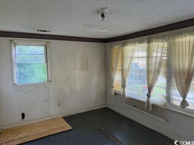 303 Leroy Bethea Rd, Mullins, SC 29574 - empty room with a textured ceiling