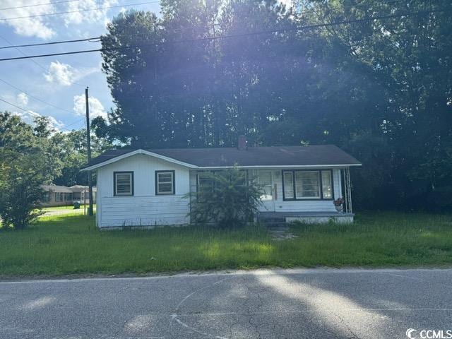 303 Leroy Bethea Rd, Mullins, SC 29574 - view of front facade featuring a front yard