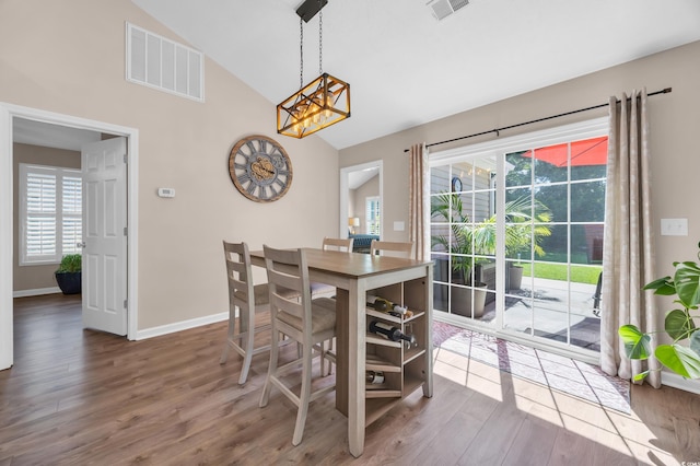 3154 Shorecrest Bay Dr, Murrells Inlet, SC 29576 - dining space featuring a chandelier, wood finished floors, and high vaulted ceiling