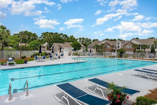 4610 Fringetree Dr, Murrells Inlet, SC 29576 - community pool with a patio and a residential view