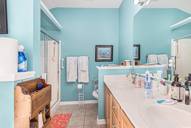 4610 Fringetree Dr, Murrells Inlet, SC 29576 - bathroom featuring lofted ceiling, a stall shower, double vanity, and tile patterned flooring