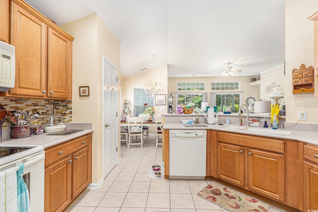4610 Fringetree Dr, Murrells Inlet, SC 29576 - kitchen with white appliances, light tile patterned flooring, tasteful backsplash, a peninsula, and ceiling fan