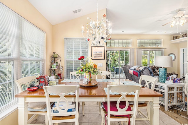 4610 Fringetree Dr, Murrells Inlet, SC 29576 - dining room with a chandelier, lofted ceiling, ceiling fan, and light tile patterned floors