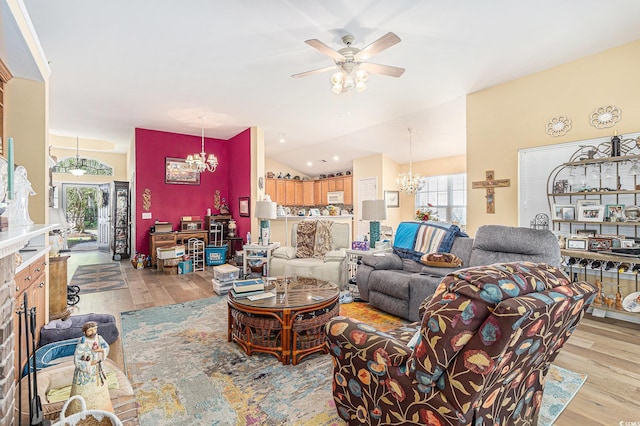 4610 Fringetree Dr, Murrells Inlet, SC 29576 - living area featuring a chandelier, light wood finished floors, lofted ceiling, and ceiling fan