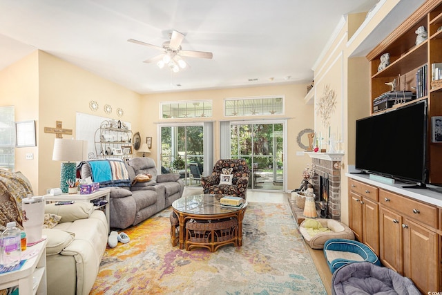 4610 Fringetree Dr, Murrells Inlet, SC 29576 - living room with a ceiling fan, a fireplace, and wood finished floors