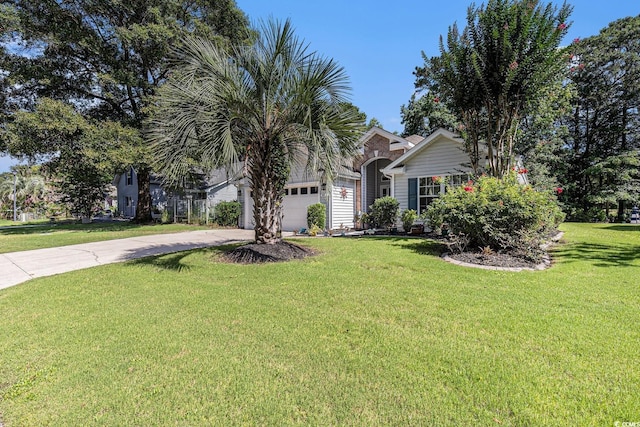 4610 Fringetree Dr, Murrells Inlet, SC 29576 - view of property hidden behind natural elements featuring concrete driveway, a garage, and a front yard