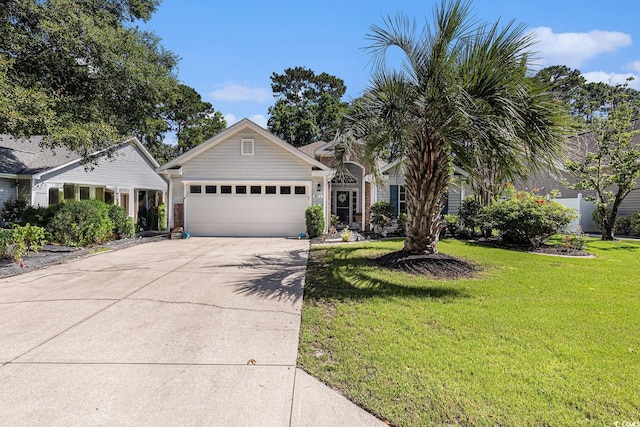 4610 Fringetree Dr, Murrells Inlet, SC 29576 - view of front of property featuring an attached garage, concrete driveway, and a front lawn