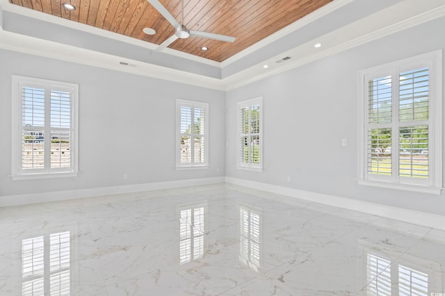 607 Boone Hall Dr, Myrtle Beach, SC 29579 - empty room featuring wooden ceiling, healthy amount of natural light, marble tiled flooring, a tray ceiling, and crown molding