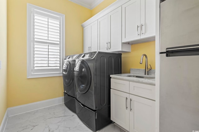 607 Boone Hall Dr, Myrtle Beach, SC 29579 - laundry area with separate washer and dryer, marble finish flooring, cabinet space, and ornamental molding