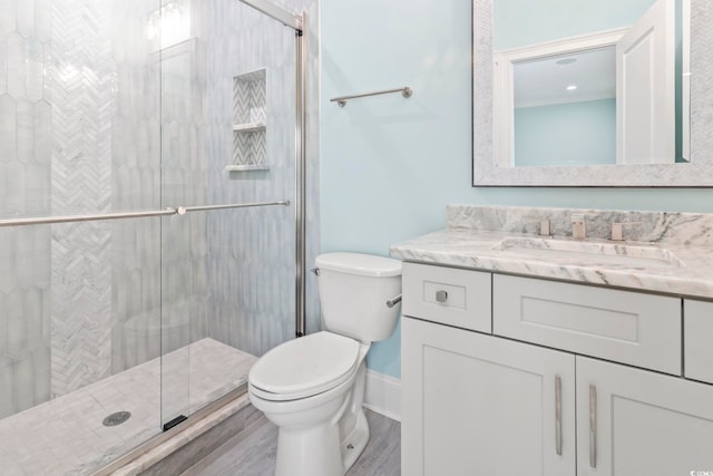 607 Boone Hall Dr, Myrtle Beach, SC 29579 - bathroom featuring vanity, a stall shower, and wood finished floors