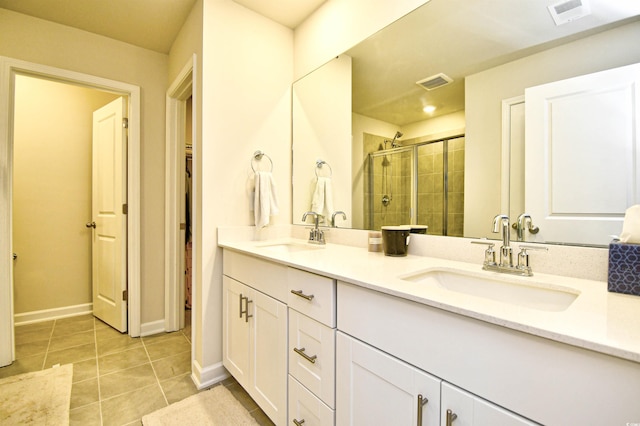 2325 Copper Creek Loop, Longs, SC 29568 - bathroom with double vanity, a shower stall, and tile patterned floors
