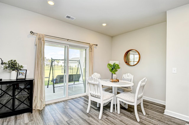 2325 Copper Creek Loop, Longs, SC 29568 - dining area with wood finished floors and recessed lighting