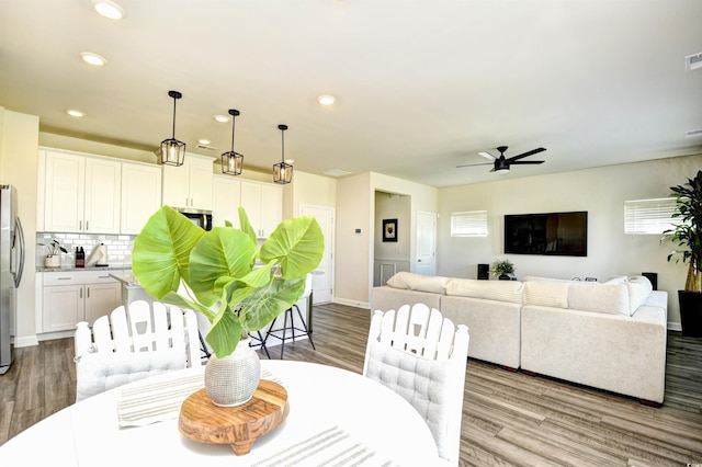 2325 Copper Creek Loop, Longs, SC 29568 - dining room with ceiling fan, recessed lighting, and wood finished floors