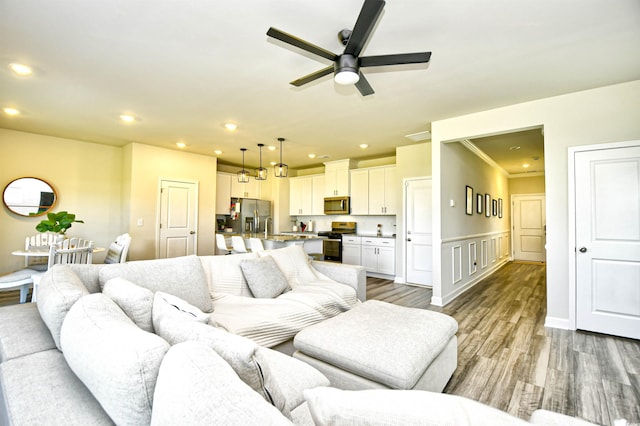2325 Copper Creek Loop, Longs, SC 29568 - living room featuring a ceiling fan, wood finished floors, and recessed lighting