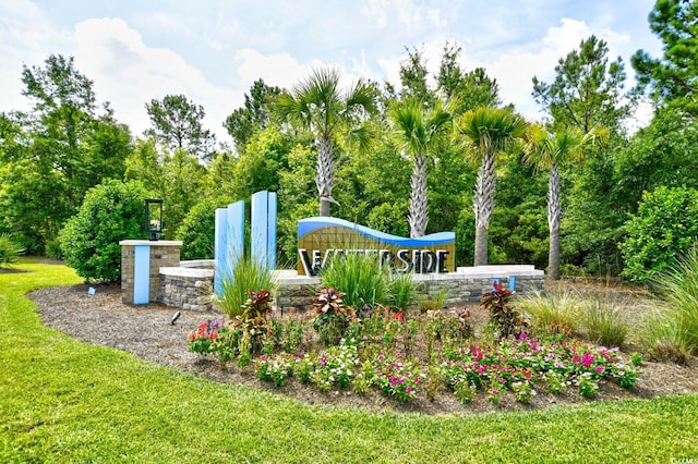 2325 Copper Creek Loop, Longs, SC 29568 - community / neighborhood sign featuring a yard and view of wooded area