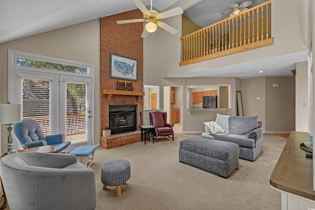 3975 River Hills Dr, Little River, SC 29566 - living area featuring a ceiling fan, light carpet, high vaulted ceiling, and a brick fireplace