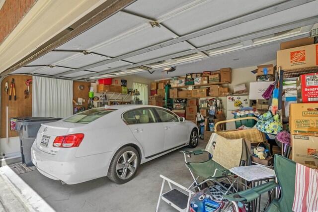 3975 River Hills Dr, Little River, SC 29566 - garage featuring a garage door opener