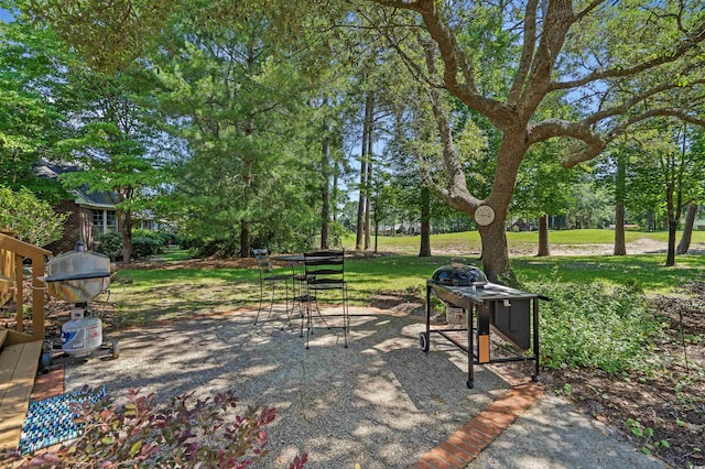 3975 River Hills Dr, Little River, SC 29566 - view of home's community featuring a lawn and view of wooded area