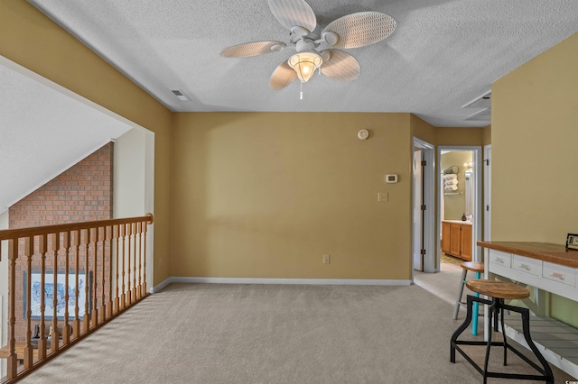 3975 River Hills Dr, Little River, SC 29566 - empty room with a textured ceiling, a ceiling fan, and carpet floors