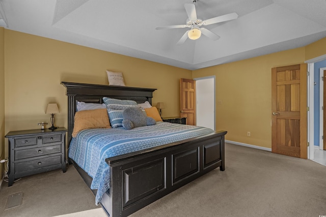 3975 River Hills Dr, Little River, SC 29566 - bedroom featuring light colored carpet, a tray ceiling, and ceiling fan