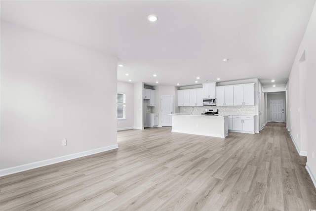 4881 Hopespring St, Myrtle Beach, SC 29579 - unfurnished living room featuring recessed lighting and light wood finished floors