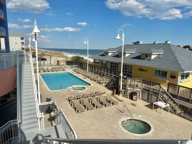 3601 N Ocean Blvd Unit 1139, North Myrtle Beach, SC 29582 - community pool with a water view, a hot tub, and a patio
