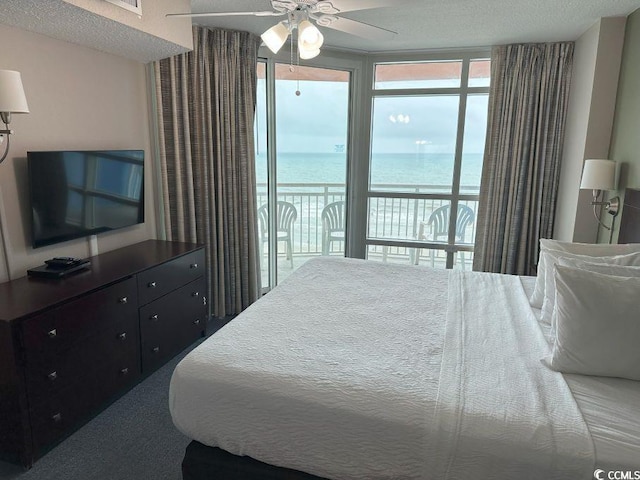 3601 N Ocean Blvd Unit 1139, North Myrtle Beach, SC 29582 - bedroom featuring access to exterior, a water view, and a ceiling fan