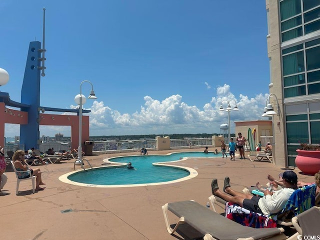 3601 N Ocean Blvd Unit 1139, North Myrtle Beach, SC 29582 - community pool featuring a patio area