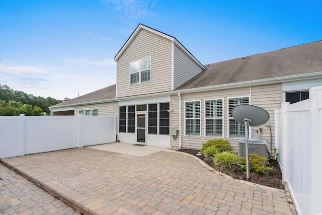 156 Parmelee Dr Unit D, Murrells Inlet, SC 29576 - rear view of property with a patio area, a sunroom, and roof with shingles