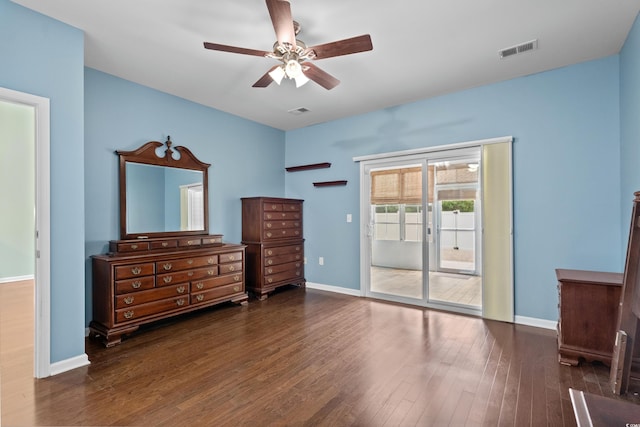 156 Parmelee Dr Unit D, Murrells Inlet, SC 29576 - unfurnished bedroom with access to exterior, wood finished floors, and a ceiling fan