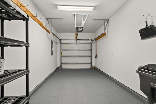 156 Parmelee Dr Unit D, Murrells Inlet, SC 29576 - garage featuring a garage door opener and baseboards