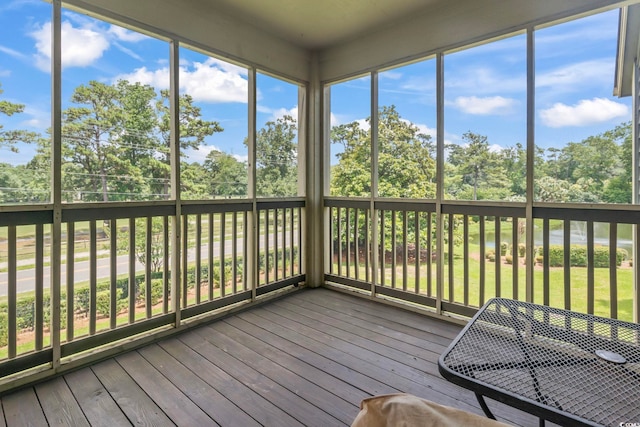 824 Castleford Cir Unit 7C, Myrtle Beach, SC 29572 - unfurnished sunroom with view of wooded area