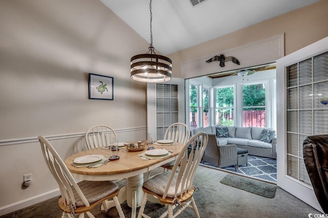2602 Clearwater St, Myrtle Beach, SC 29579 - dining space with carpet floors, vaulted ceiling, and a chandelier