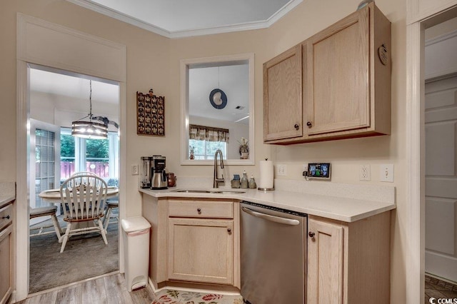 2602 Clearwater St, Myrtle Beach, SC 29579 - kitchen with dishwasher, light brown cabinets, light wood-style floors, light countertops, and crown molding