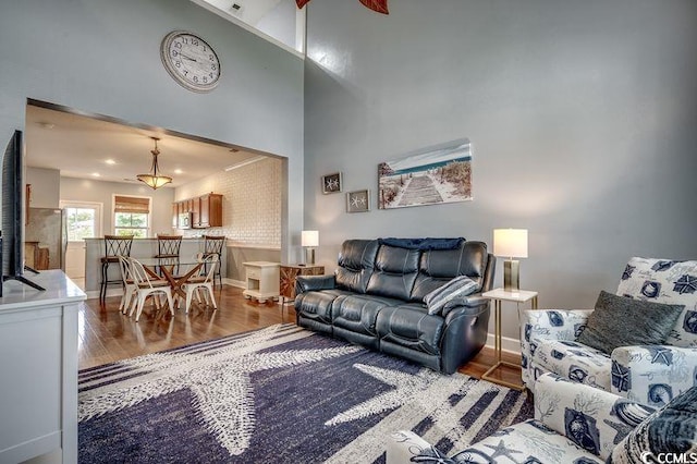100 Culpepper Way Unit 1002, Myrtle Beach, SC 29579 - living area featuring wood finished floors and a towering ceiling