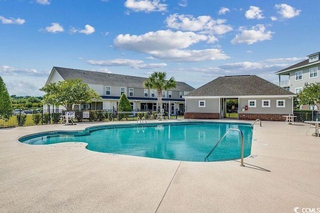 100 Culpepper Way Unit 1002, Myrtle Beach, SC 29579 - community pool featuring a patio