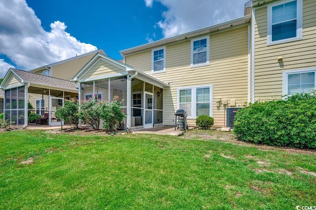 100 Culpepper Way Unit 1002, Myrtle Beach, SC 29579 - rear view of property featuring a sunroom and a lawn